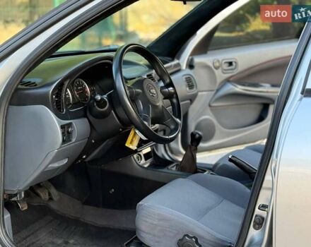 Серый Ниссан Альмера, объемом двигателя 1.5 л и пробегом 310 тыс. км за 3200 $, фото 14 на Automoto.ua