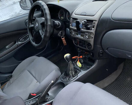 Серый Ниссан Альмера, объемом двигателя 1.5 л и пробегом 265 тыс. км за 1800 $, фото 5 на Automoto.ua