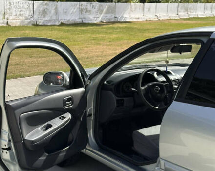 Сірий Ніссан Альмера, об'ємом двигуна 1.6 л та пробігом 240 тис. км за 4350 $, фото 6 на Automoto.ua