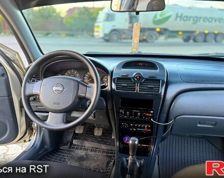 Сірий Ніссан Альмера, об'ємом двигуна 1.6 л та пробігом 340 тис. км за 4199 $, фото 10 на Automoto.ua