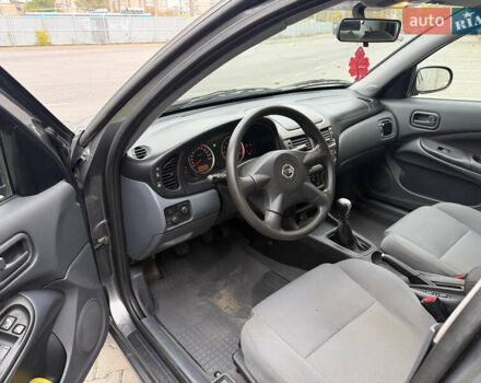 Серый Ниссан Альмера, объемом двигателя 1.8 л и пробегом 105 тыс. км за 3800 $, фото 5 на Automoto.ua