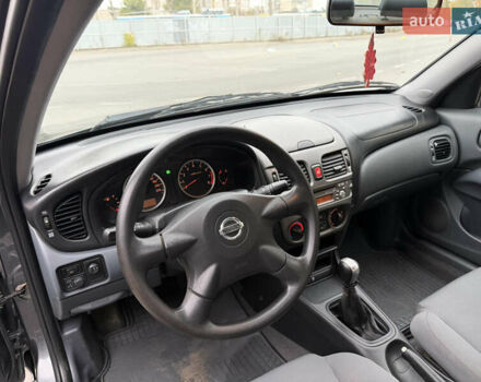 Серый Ниссан Альмера, объемом двигателя 1.8 л и пробегом 105 тыс. км за 3800 $, фото 7 на Automoto.ua