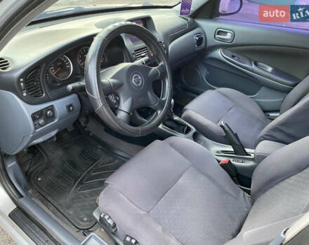 Сірий Ніссан Альмера, об'ємом двигуна 1.5 л та пробігом 299 тис. км за 2850 $, фото 5 на Automoto.ua