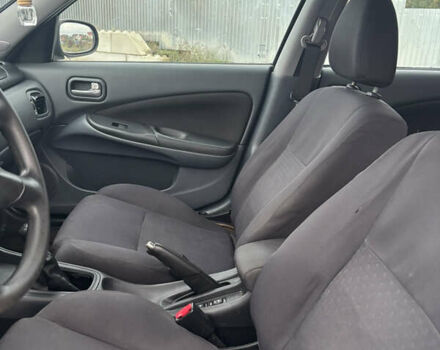 Серый Ниссан Альмера, объемом двигателя 1.5 л и пробегом 266 тыс. км за 3595 $, фото 8 на Automoto.ua