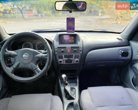 Сірий Ніссан Альмера, об'ємом двигуна 1.5 л та пробігом 299 тис. км за 2850 $, фото 6 на Automoto.ua