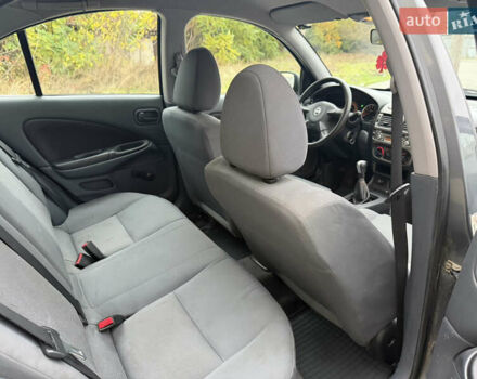 Серый Ниссан Альмера, объемом двигателя 1.8 л и пробегом 105 тыс. км за 3800 $, фото 6 на Automoto.ua