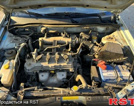 Серый Ниссан Альмера, объемом двигателя 1.6 л и пробегом 100 тыс. км за 5700 $, фото 11 на Automoto.ua