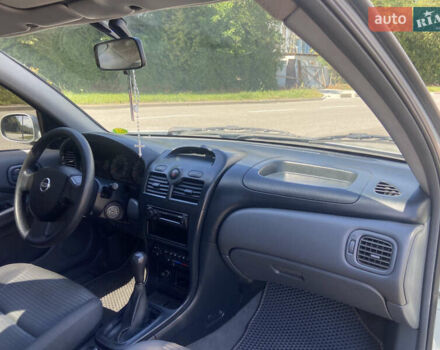 Серый Ниссан Альмера, объемом двигателя 1.6 л и пробегом 240 тыс. км за 4300 $, фото 5 на Automoto.ua
