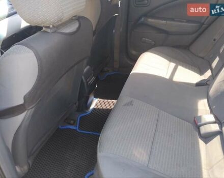 Сірий Ніссан Альмера, об'ємом двигуна 1.6 л та пробігом 190 тис. км за 5100 $, фото 20 на Automoto.ua
