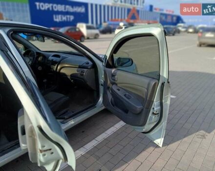 Серый Ниссан Альмера, объемом двигателя 1.6 л и пробегом 255 тыс. км за 4950 $, фото 22 на Automoto.ua