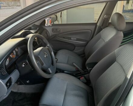 Сірий Ніссан Альмера, об'ємом двигуна 1.6 л та пробігом 162 тис. км за 4350 $, фото 7 на Automoto.ua