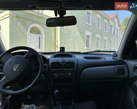Серый Ниссан Альмера, объемом двигателя 1.6 л и пробегом 170 тыс. км за 3000 $, фото 6 на Automoto.ua