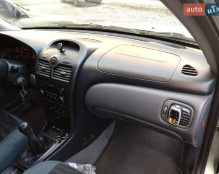 Серый Ниссан Альмера, объемом двигателя 1.6 л и пробегом 233 тыс. км за 3800 $, фото 1 на Automoto.ua