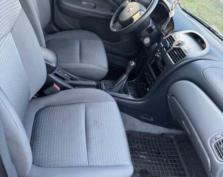 Серый Ниссан Альмера, объемом двигателя 1.6 л и пробегом 78 тыс. км за 6200 $, фото 7 на Automoto.ua