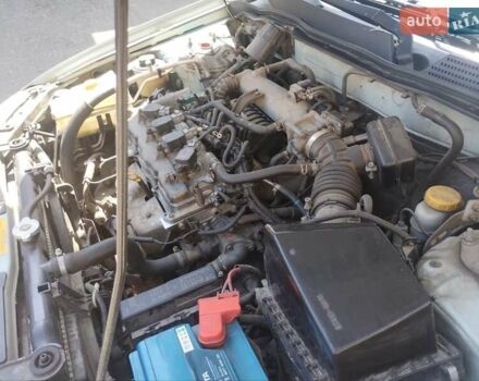 Сірий Ніссан Альмера, об'ємом двигуна 1.6 л та пробігом 190 тис. км за 5100 $, фото 4 на Automoto.ua