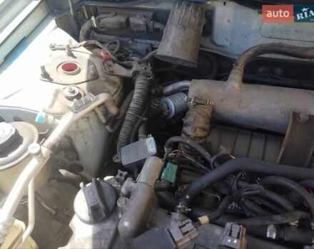 Сірий Ніссан Альмера, об'ємом двигуна 1.6 л та пробігом 190 тис. км за 5100 $, фото 6 на Automoto.ua