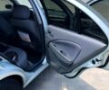 Сірий Ніссан Альмера, об'ємом двигуна 1.6 л та пробігом 184 тис. км за 6200 $, фото 6 на Automoto.ua