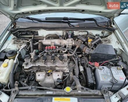 Серый Ниссан Альмера, объемом двигателя 1.6 л и пробегом 245 тыс. км за 4400 $, фото 10 на Automoto.ua