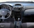 Сірий Ніссан Альмера, об'ємом двигуна 1.6 л та пробігом 209 тис. км за 5350 $, фото 8 на Automoto.ua