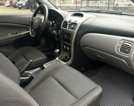 Сірий Ніссан Альмера, об'ємом двигуна 1.6 л та пробігом 220 тис. км за 4800 $, фото 8 на Automoto.ua