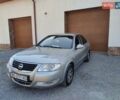 Сірий Ніссан Альмера, об'ємом двигуна 1.6 л та пробігом 260 тис. км за 4550 $, фото 6 на Automoto.ua