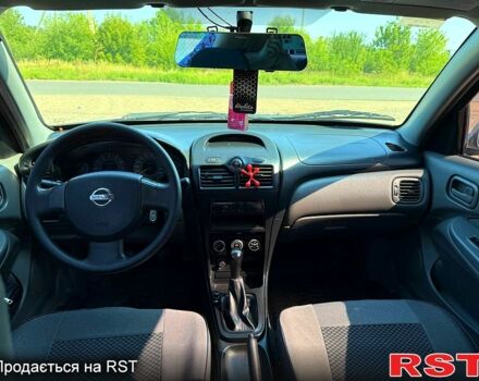 Серый Ниссан Альмера, объемом двигателя 1.6 л и пробегом 210 тыс. км за 5300 $, фото 7 на Automoto.ua