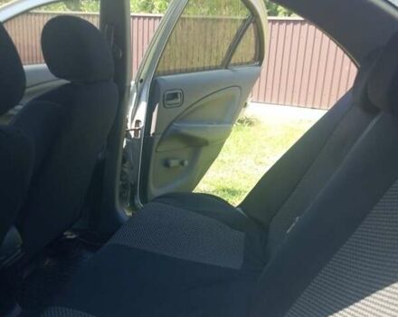 Сірий Ніссан Альмера, об'ємом двигуна 1.6 л та пробігом 263 тис. км за 4600 $, фото 9 на Automoto.ua