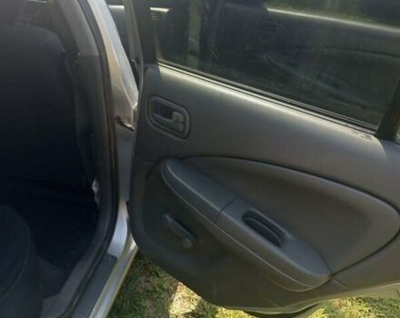 Сірий Ніссан Альмера, об'ємом двигуна 1.6 л та пробігом 263 тис. км за 4600 $, фото 8 на Automoto.ua