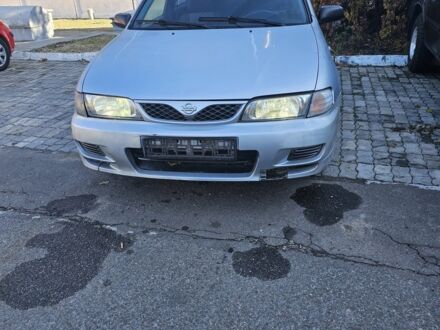 Серый Ниссан Альмера, объемом двигателя 1.6 л и пробегом 320 тыс. км за 650 $, фото 1 на Automoto.ua