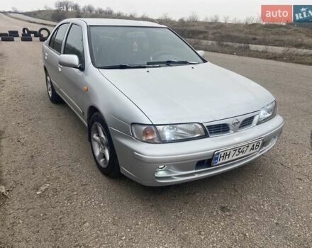 Серый Ниссан Альмера, объемом двигателя 1.4 л и пробегом 235 тыс. км за 2000 $, фото 1 на Automoto.ua