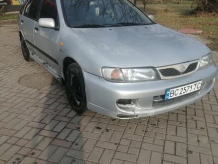 Серый Ниссан Альмера, объемом двигателя 1.6 л и пробегом 247 тыс. км за 950 $, фото 1 на Automoto.ua