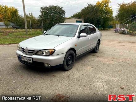 Серый Ниссан Альмера, объемом двигателя 2 л и пробегом 205 тыс. км за 2290 $, фото 1 на Automoto.ua