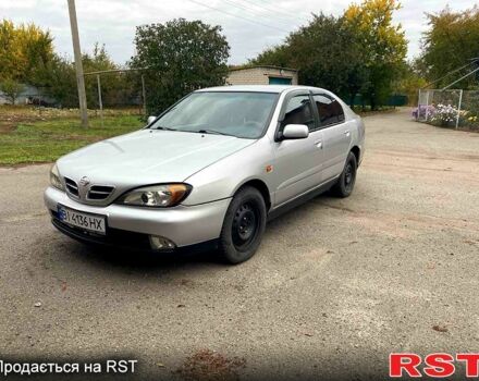 Серый Ниссан Альмера, объемом двигателя 2 л и пробегом 205 тыс. км за 2290 $, фото 1 на Automoto.ua