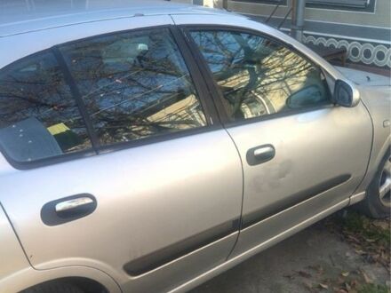 Серый Ниссан Альмера, объемом двигателя 2.2 л и пробегом 320 тыс. км за 1200 $, фото 1 на Automoto.ua