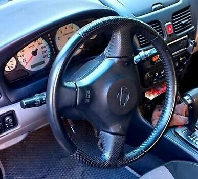 Сірий Ніссан Альмера, об'ємом двигуна 1.8 л та пробігом 280 тис. км за 3001 $, фото 1 на Automoto.ua