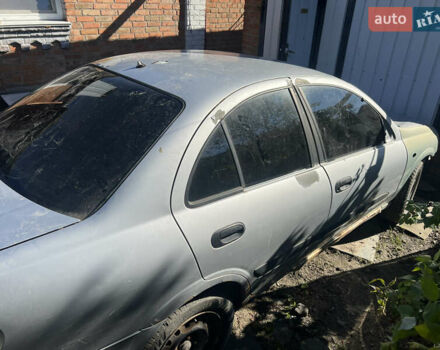 Сірий Ніссан Альмера, об'ємом двигуна 1.5 л та пробігом 240 тис. км за 1700 $, фото 1 на Automoto.ua