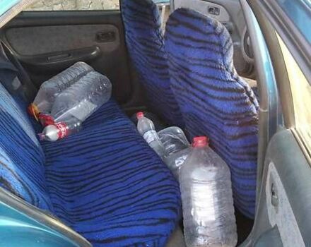 Синій Ніссан Альмера, об'ємом двигуна 1.4 л та пробігом 300 тис. км за 1500 $, фото 2 на Automoto.ua