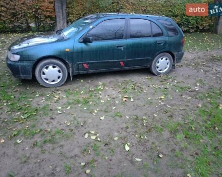 Синий Ниссан Альмера, объемом двигателя 1.4 л и пробегом 210 тыс. км за 1650 $, фото 2 на Automoto.ua