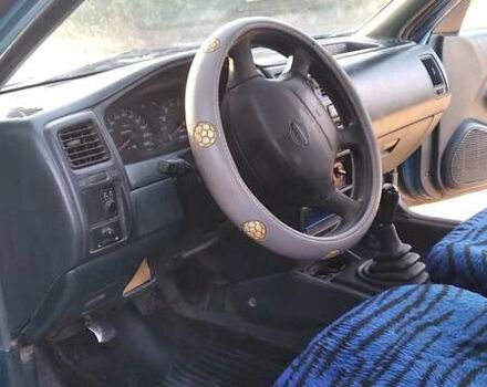 Синій Ніссан Альмера, об'ємом двигуна 1.4 л та пробігом 300 тис. км за 1500 $, фото 1 на Automoto.ua