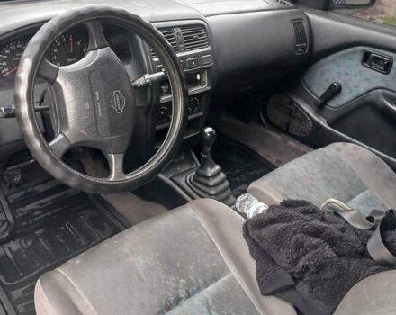 Синий Ниссан Альмера, объемом двигателя 1.4 л и пробегом 370 тыс. км за 1800 $, фото 1 на Automoto.ua