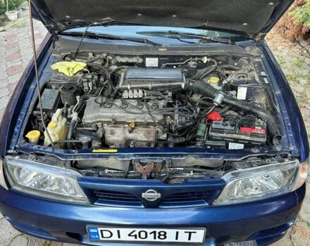 Синий Ниссан Альмера, объемом двигателя 1.4 л и пробегом 310 тыс. км за 1550 $, фото 12 на Automoto.ua