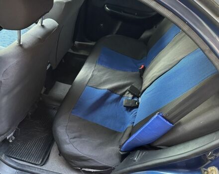 Синий Ниссан Альмера, объемом двигателя 1.4 л и пробегом 310 тыс. км за 1550 $, фото 10 на Automoto.ua