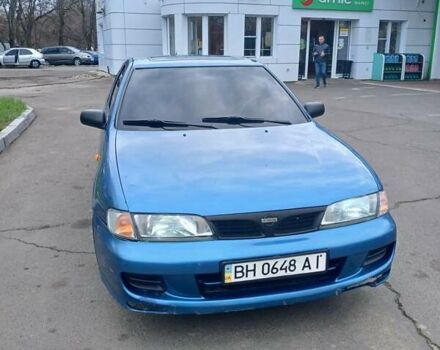 Синий Ниссан Альмера, объемом двигателя 1.4 л и пробегом 370 тыс. км за 1800 $, фото 3 на Automoto.ua