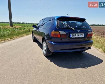 Синій Ніссан Альмера, об'ємом двигуна 1.4 л та пробігом 312 тис. км за 2050 $, фото 6 на Automoto.ua