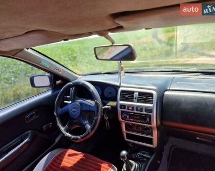 Синій Ніссан Альмера, об'ємом двигуна 1.4 л та пробігом 312 тис. км за 2050 $, фото 9 на Automoto.ua