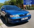 Синий Ниссан Альмера, объемом двигателя 1.4 л и пробегом 350 тыс. км за 2400 $, фото 1 на Automoto.ua
