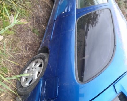 Синій Ніссан Альмера, об'ємом двигуна 1 л та пробігом 300 тис. км за 1350 $, фото 2 на Automoto.ua