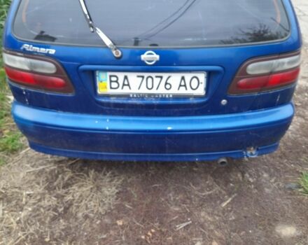 Синій Ніссан Альмера, об'ємом двигуна 1 л та пробігом 300 тис. км за 1350 $, фото 1 на Automoto.ua