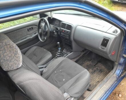 Синій Ніссан Альмера, об'ємом двигуна 1 л та пробігом 300 тис. км за 1350 $, фото 4 на Automoto.ua