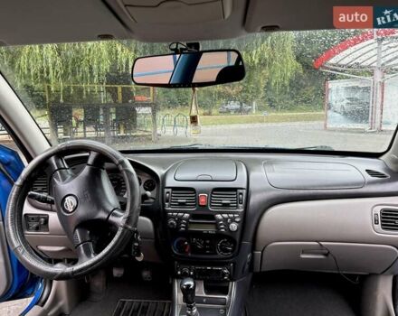 Синий Ниссан Альмера, объемом двигателя 2.2 л и пробегом 200 тыс. км за 3800 $, фото 4 на Automoto.ua